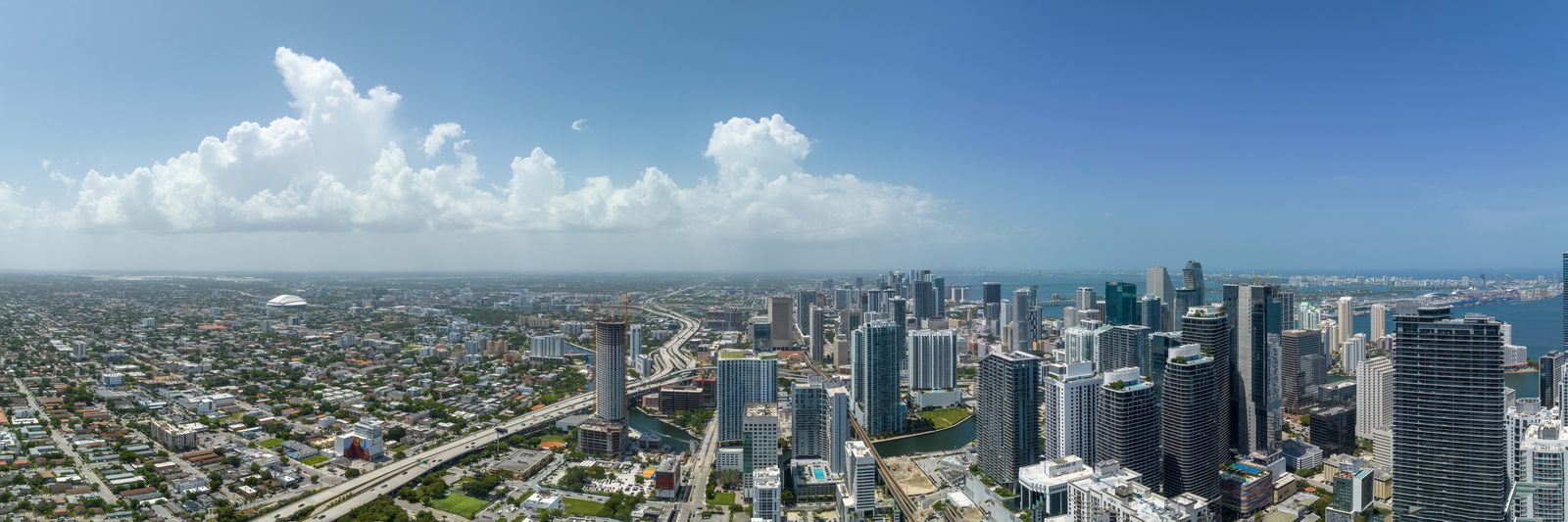 View north over the Brickell towers and the Miami River from Levels 65 to 67 of the South tower, developer view photography